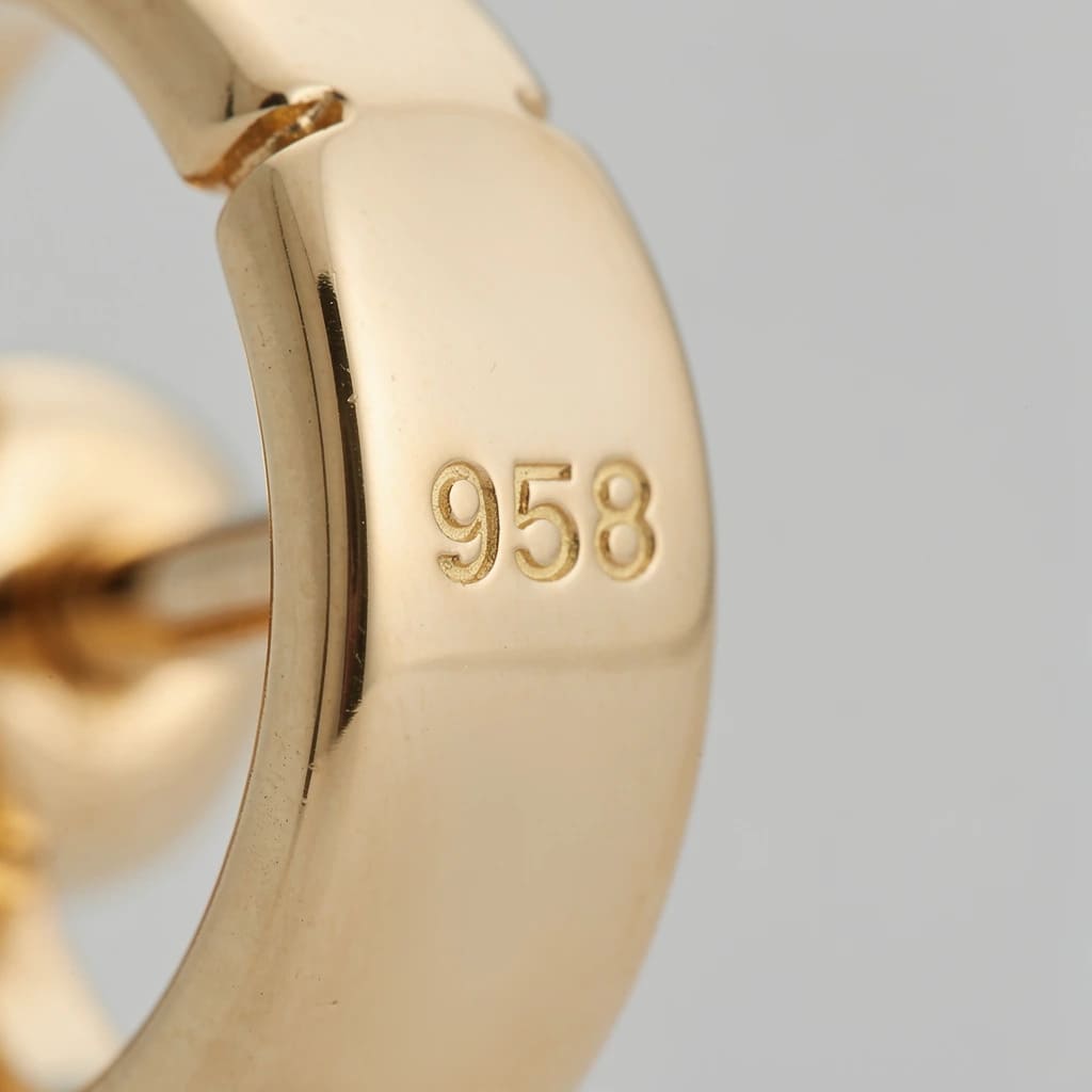 Золото 958 пробы